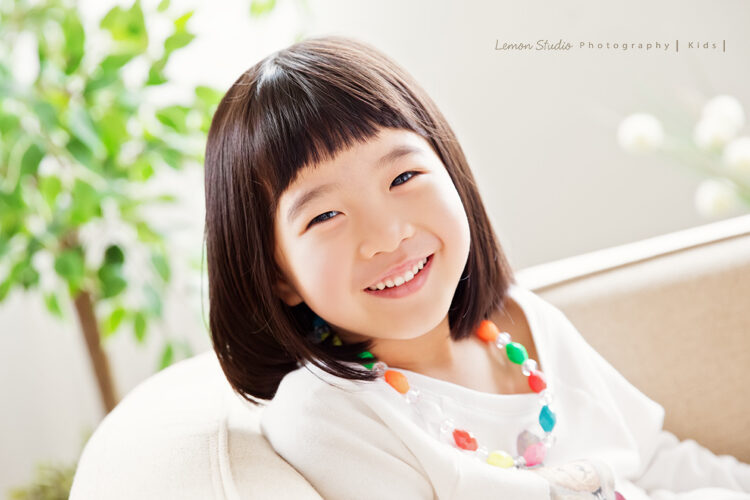 琬茲&楷元一家第三次來拍家庭照，這張琬茲的笑容帶著有些成熟的味道！
